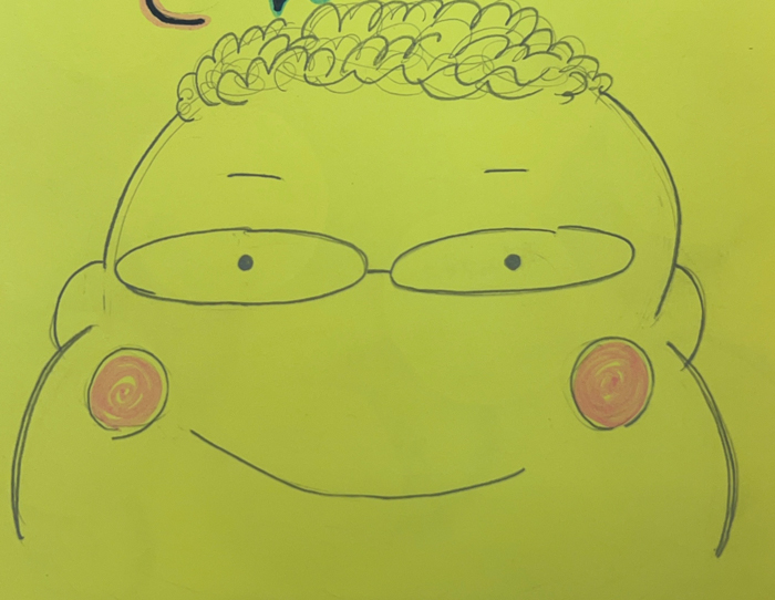 生徒が描いてくれた井上さんの似顔絵です